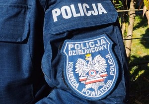 obraz przedstawia naszywkę policyjną